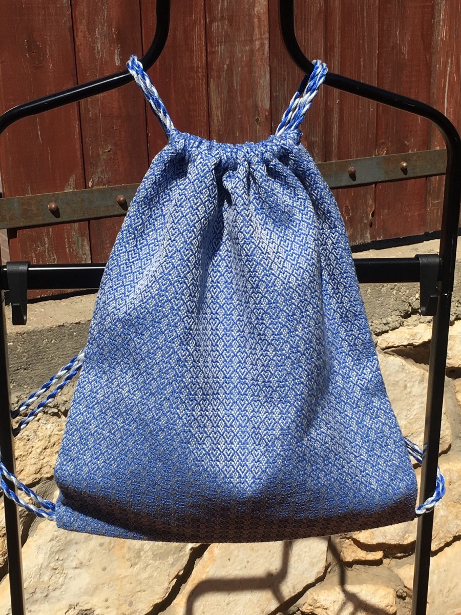 Blue hand-woven drawstring backpack
